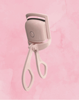 Back view of the LunaLash Styler in pink, showcasing its ergonomic shape.